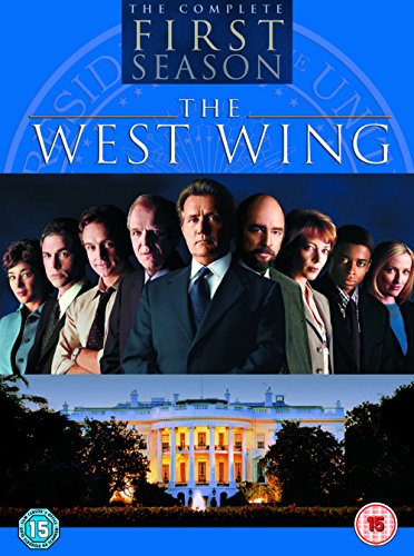 "West Wing Season 1 DVD cover featuring main cast and the White House."