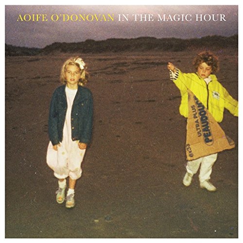 Vinyl record cover featuring two young girls standing on a beach at dusk.