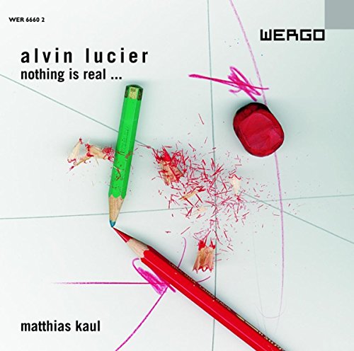 "Album cover with broken colored pencils and shavings on a white background."