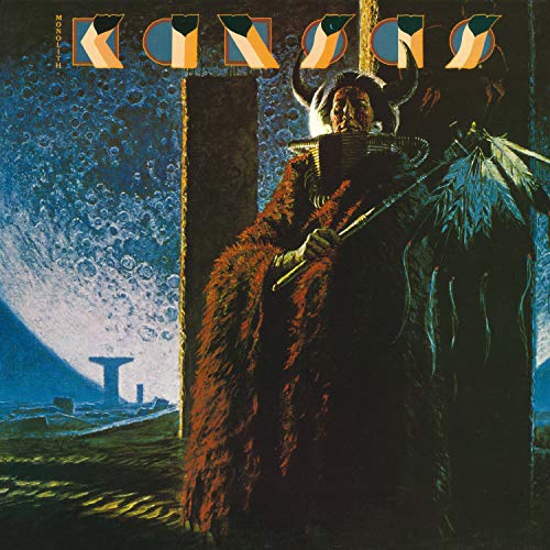 "Album cover for 'Kansas - Monolith' featuring a person in a fur coat and helmet."