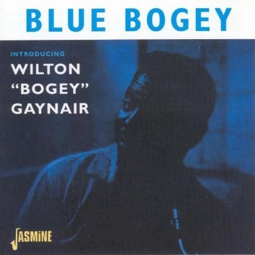 "CD cover with a blue-tinted image of a man's profile and bold text."