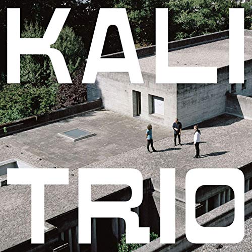 "KALI TRIO" in large white text over an image of three people on a rooftop.
