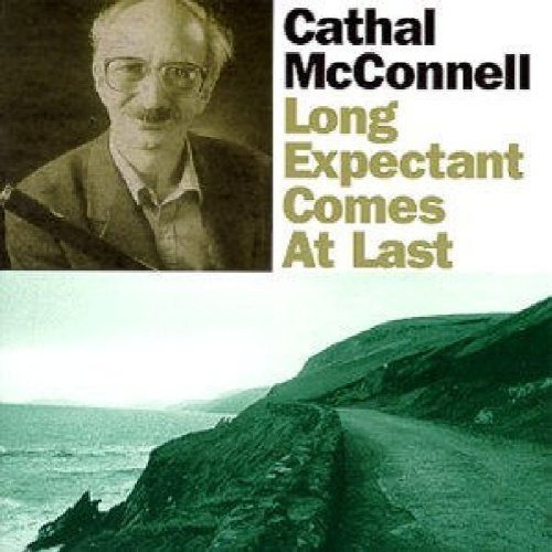 "Album cover with black and white portrait and coastal landscape, featuring artist's name and title."