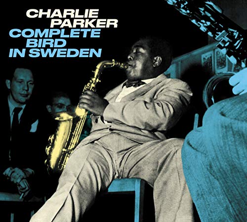 "Album cover featuring Charlie Parker playing saxophone with two men in the background."