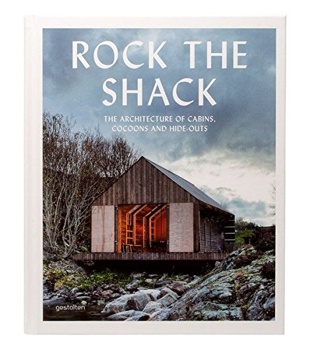 "Book cover featuring a modern cabin on a rocky hillside with trees."