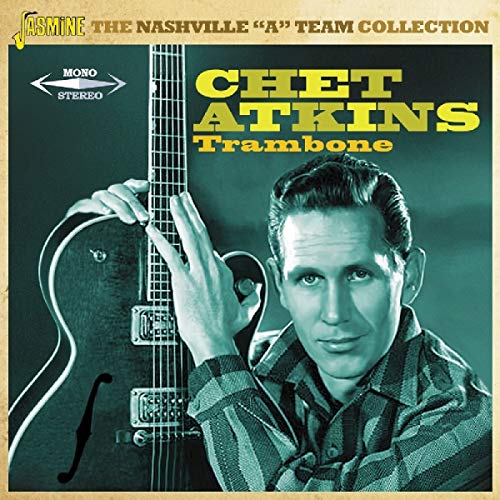 Chet Atkins album cover featuring a man holding a guitar against a dark green background.