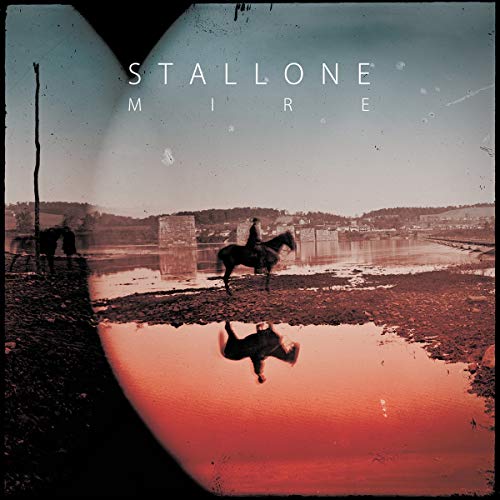 "Vinyl album cover with a man on horseback reflected in a body of water."