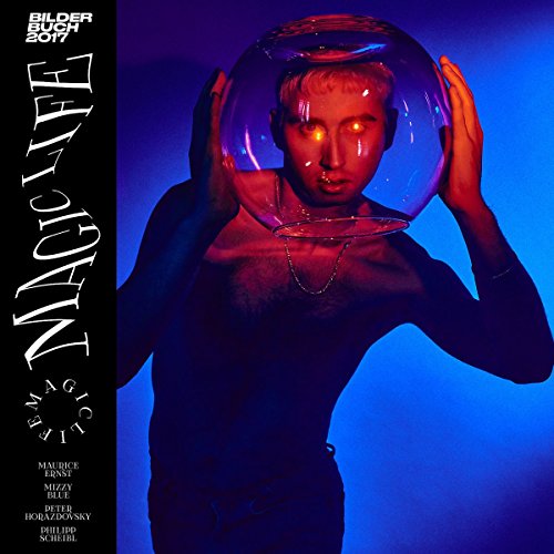 "Album cover with man holding glass orb, glowing eyes, against blue background."