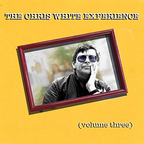 Album cover with a black and white photo of a man wearing sunglasses.