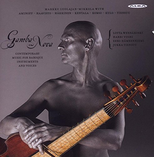A man holding a viol holds a viol against a dark background.