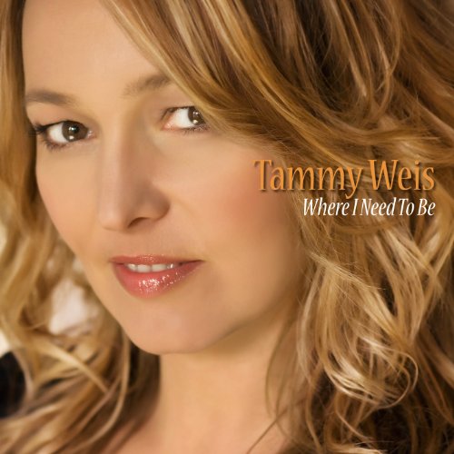 "Album cover featuring a close-up of a woman with blonde hair and text."