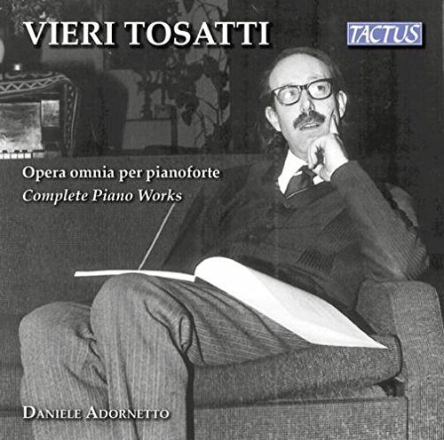 Black and white CD cover featuring a man sitting on a couch with sheet music.