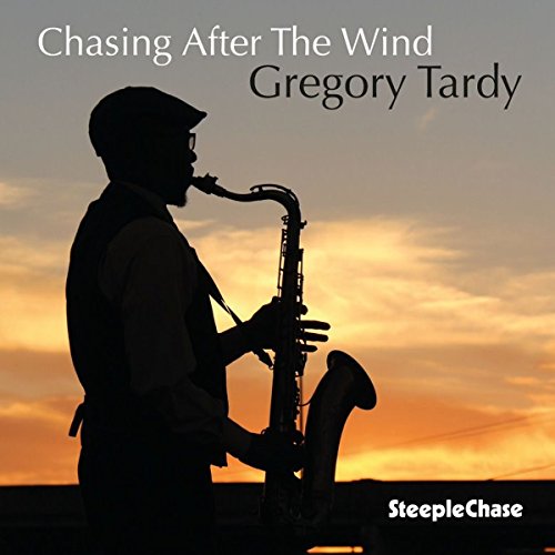 "Album cover featuring a silhouette of a man playing saxophone at sunset."