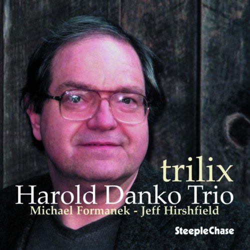"Album cover with a man's portrait and text 'trilix Harold Danko Trio' on a wooden background."