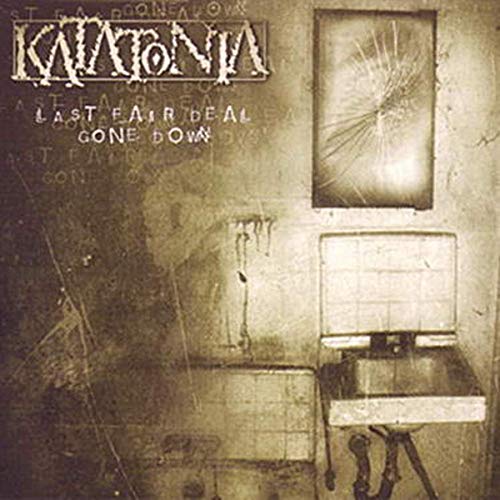 "Katatonia album cover featuring a sepia-toned, grungy bathroom scene with a sink and mirror."