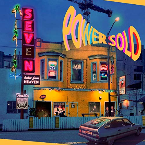 "Album cover: yellow building with neon sign and car in front."