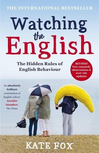 "Book cover of 'Watching the English' by Kate Fox, showing two people with umbrellas."