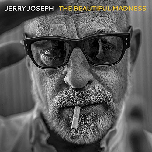 Black and white album cover with a man wearing sunglasses and holding a cigarette.