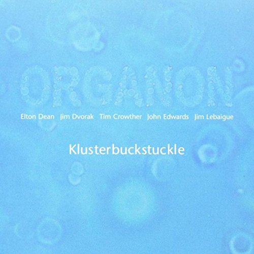 "Blue album cover with 'ORGANON' and 'Klusterbuckstuckle' text, featuring artist names."