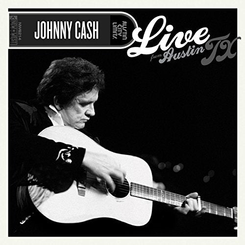 "Black and white vinyl album cover featuring Johnny Cash playing guitar."