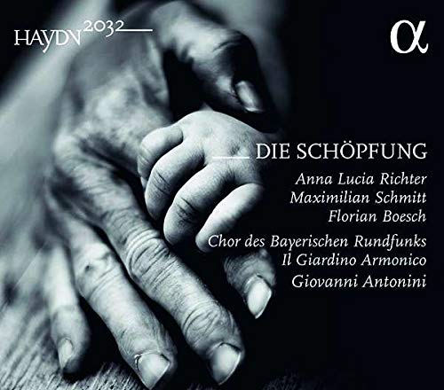 Black and white CD cover with two hands clasped together, featuring white text.