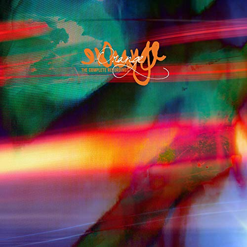 The image depicts a vinyl record cover with a blurred, multicolored background and orange text. Alt text: Blurred multicolored vinyl cover with "S. Orange: The Complete Recordings" in orange text.
