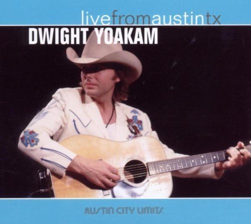 Dwight Yoakam in a white cowboy outfit playing guitar on a CD cover.