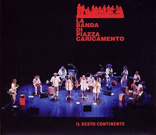 "Album cover featuring a band performing on stage, with red text and logo."