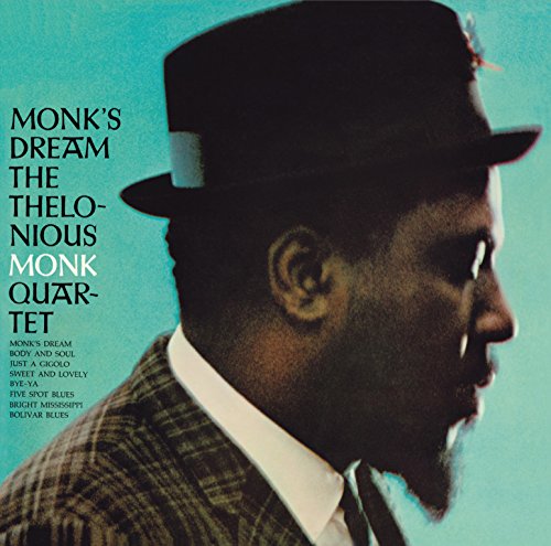 "Album cover featuring Thelonious Monk in a hat against a teal background."