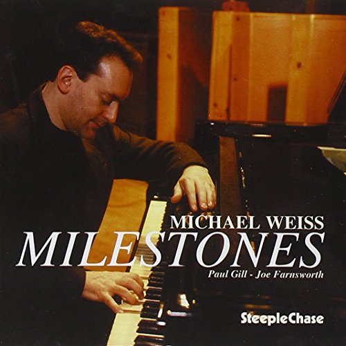 "Album cover with a man playing piano and white text overlay."