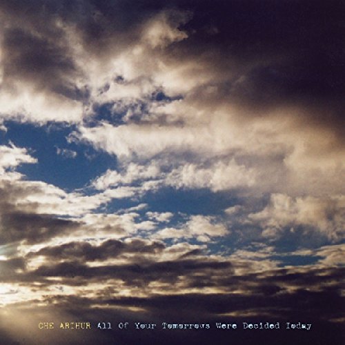 A cloudy sky with the album title and artist name at the bottom.