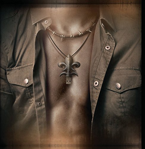 A man wears an open shirt, revealing a USB drive on a necklace.