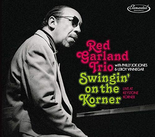 Album cover featuring a black-and-white photo of Red Garland playing piano with colorful text overlay.
