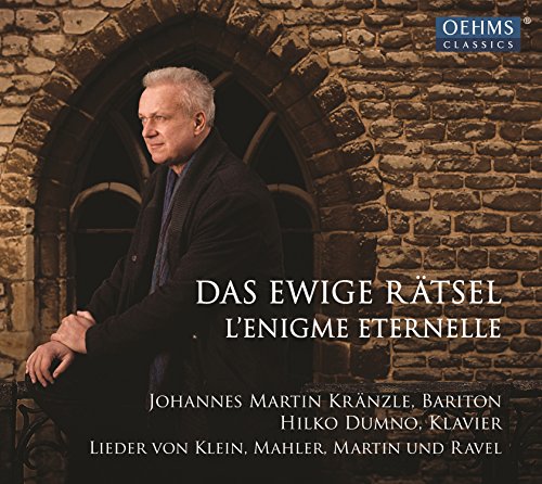 "Album cover with man standing by stone archway, text in white and blue logo."