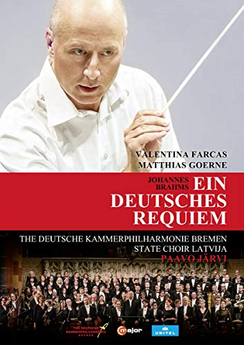 DVD cover featuring a conductor and a choir with red and black text overlay.