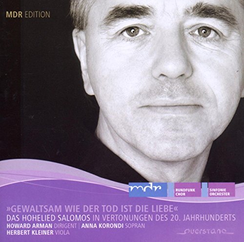 Black and white portrait of a man on a CD cover with purple accents.