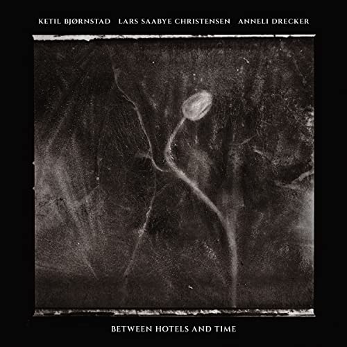 CD cover for Ketil Bjornstad’s “Between Hotels and Time,” abstract grayscale image.