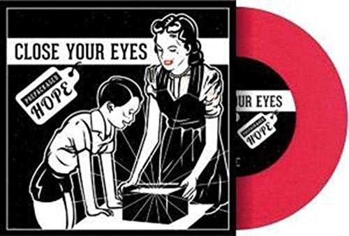 "Black and white vinyl album cover with illustration of a man and woman."