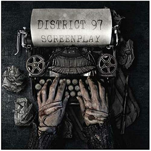 "Album cover with a typewriter and hands typing, surrounded by crumpled paper."