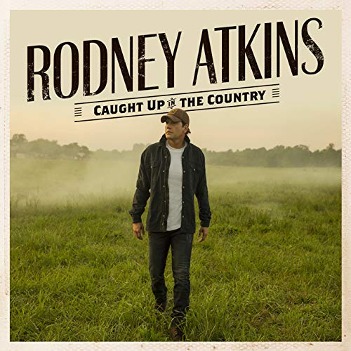 "Album cover featuring Rodney Atkins standing in a misty green field."