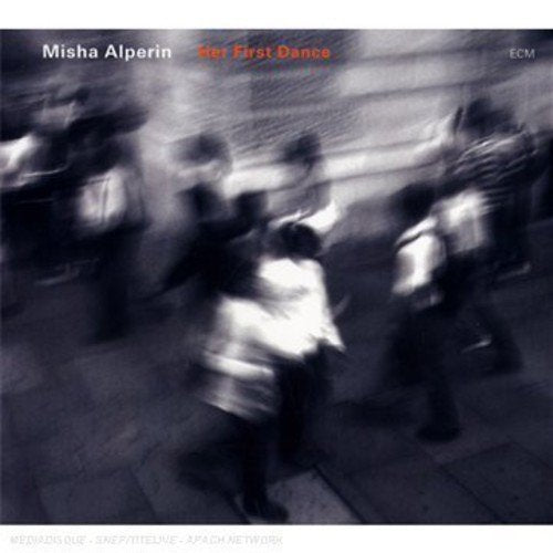 "Blurry black and white image of dancing figures on a CD album cover."