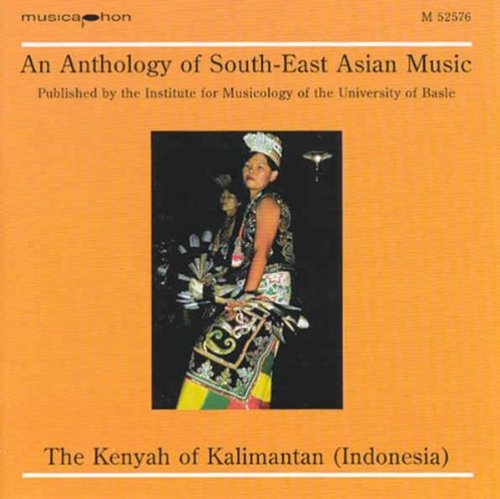 The image shows a CD cover with a person in traditional attire. An appropriate alt text is: "Orange CD cover with a person in traditional Kenyah clothing."