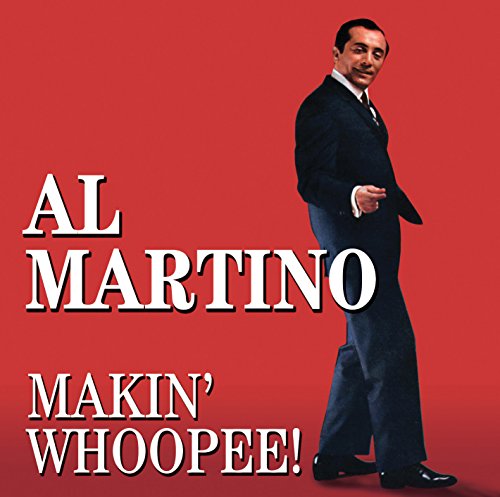 Al Martino in a black suit on a red background, album cover.
