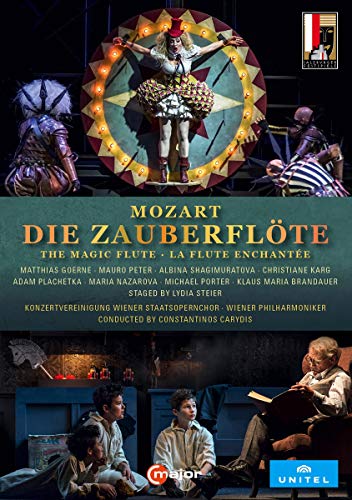 "DVD cover for Mozart's 'The Magic Flute' with opera scenes and title text."