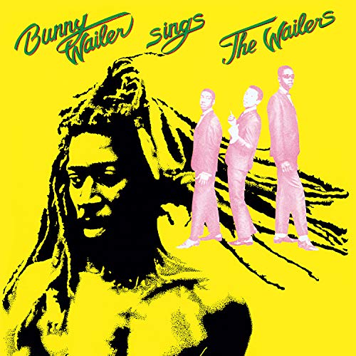 "Vinyl record cover with a yellow background and stylized image of Bunny Wailer and The Wailers."