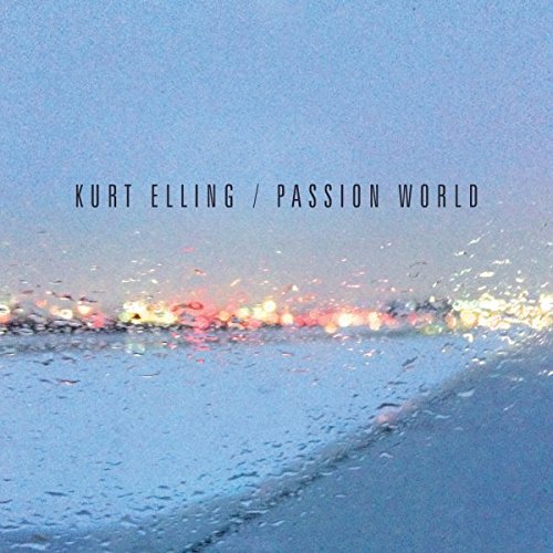 "Album cover for 'Passion World' by Kurt Elling, showing a rainy window with city lights."