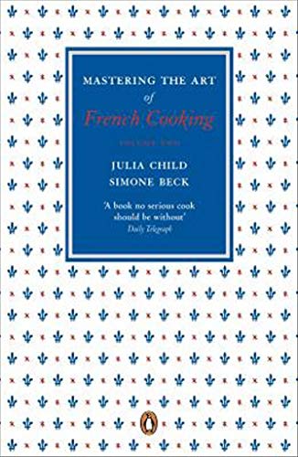"Book cover with blue and red pattern, featuring title 'Mastering the Art of French Cooking'."
