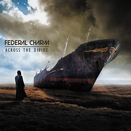 "Album cover art: person standing near a beached ship with cloudy sky."