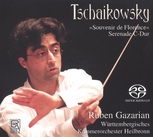 CD cover with conductor in white shirt holding baton against a black background.