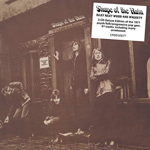 "Sepia-toned album cover featuring four men lounging outside a building, with a white label."
